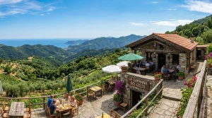 Terrazza panoramica del ristorante La Capanna dei Celti con vista sui monti e mare della Liguria